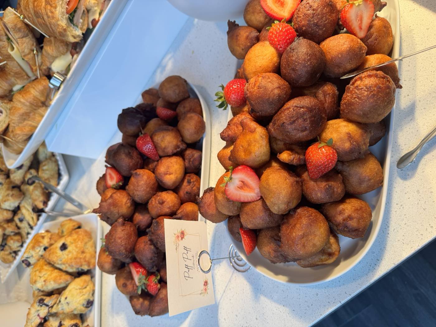 A platter of Bofrot with strawberries by GourmetMaria, a festive party bite